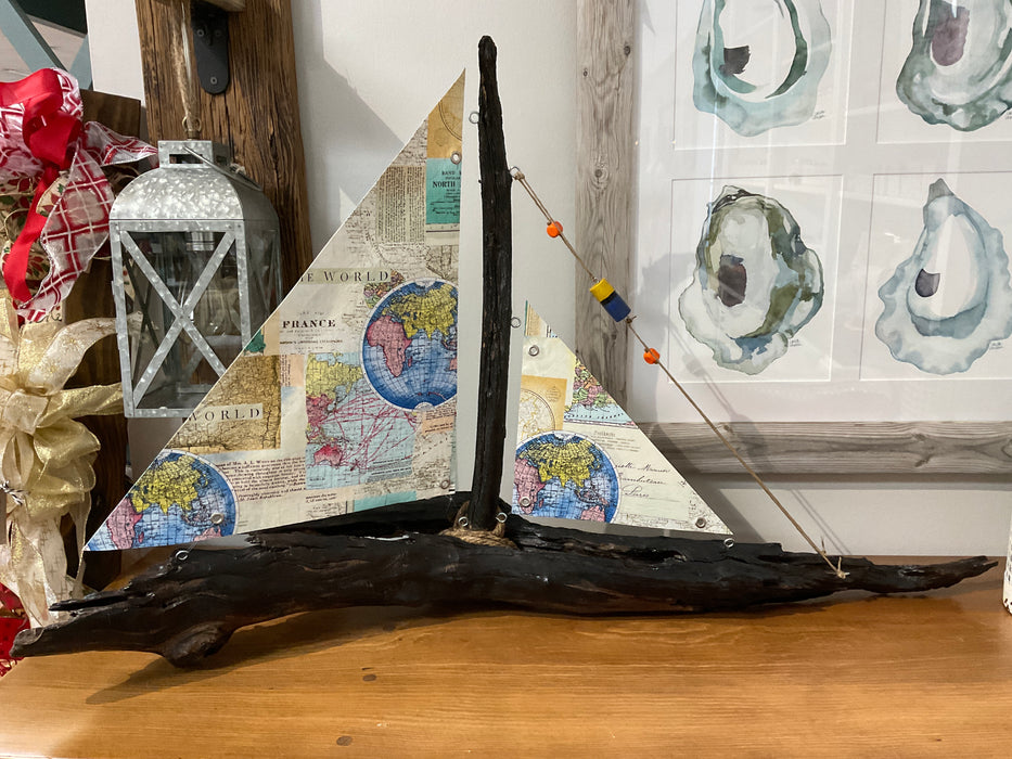 Driftwood sailboat with sails
