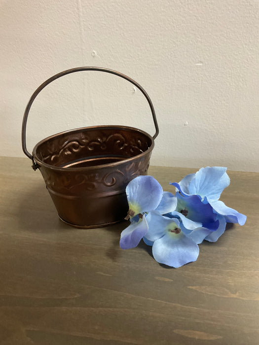 Small metal bucket