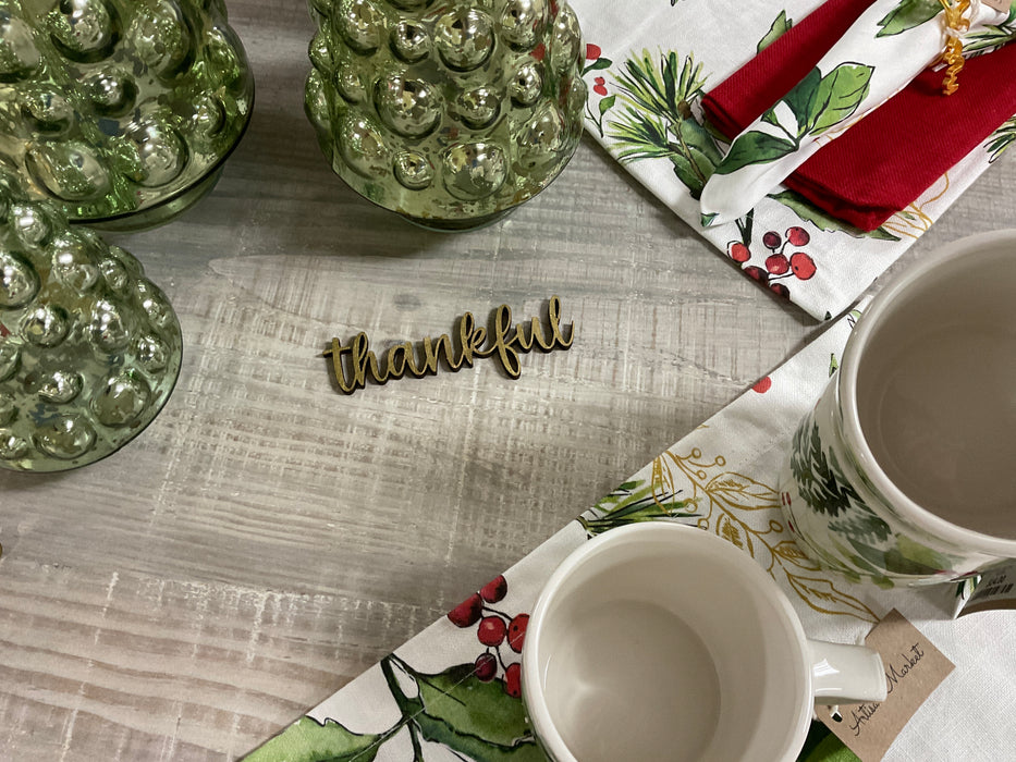 Cut-out wood plate words.