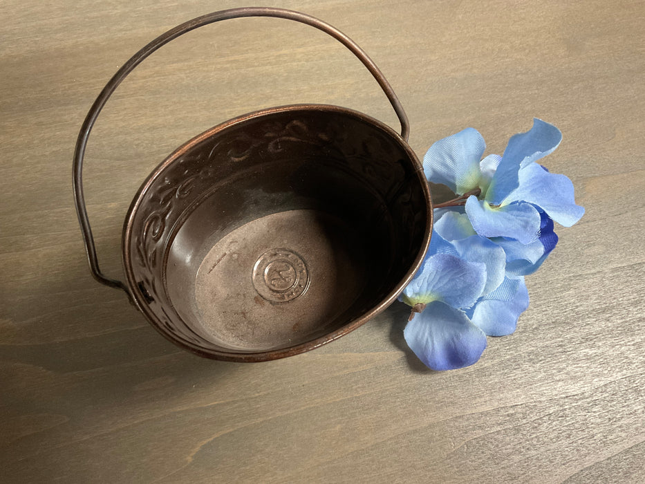 Small metal bucket