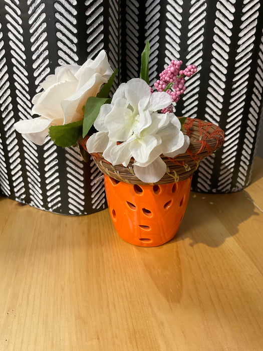 Orange pine needle vase