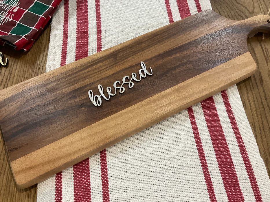 Cut-out wood plate words.