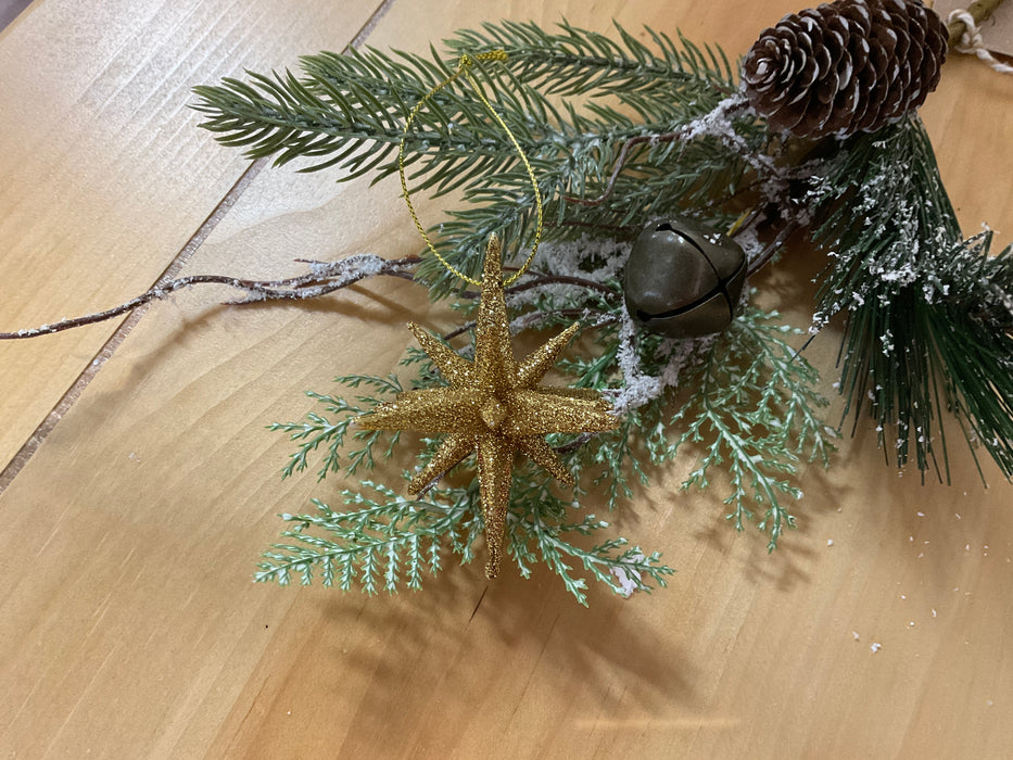 9 point gold glitter star ornament