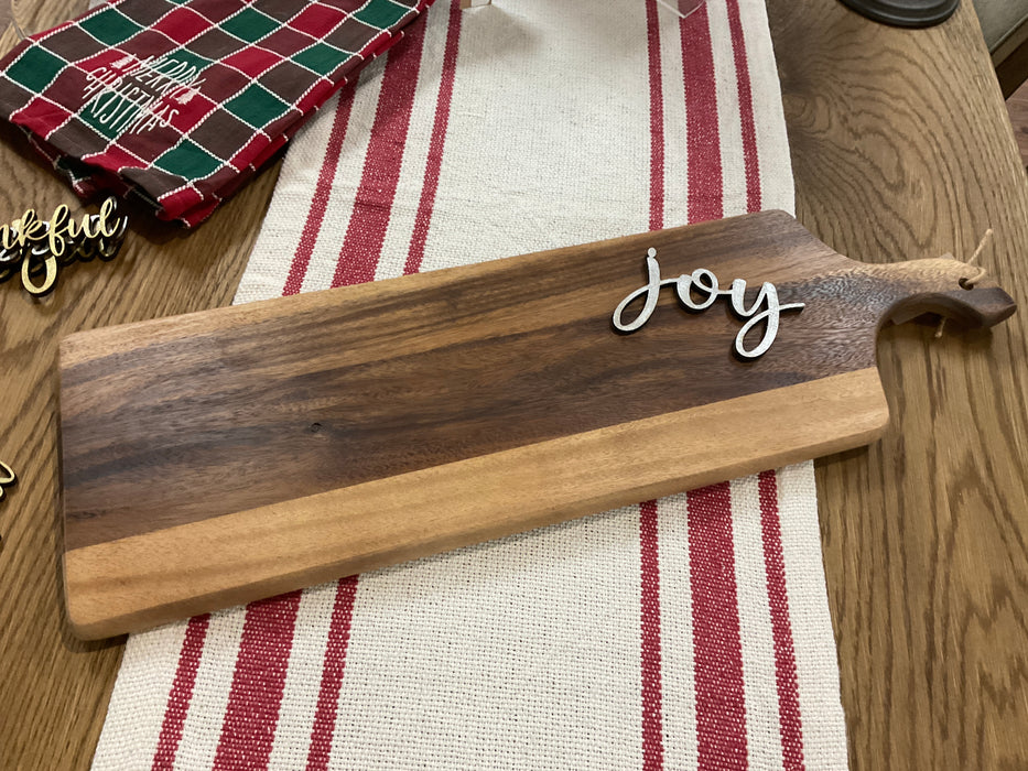 Cut-out wood plate words.