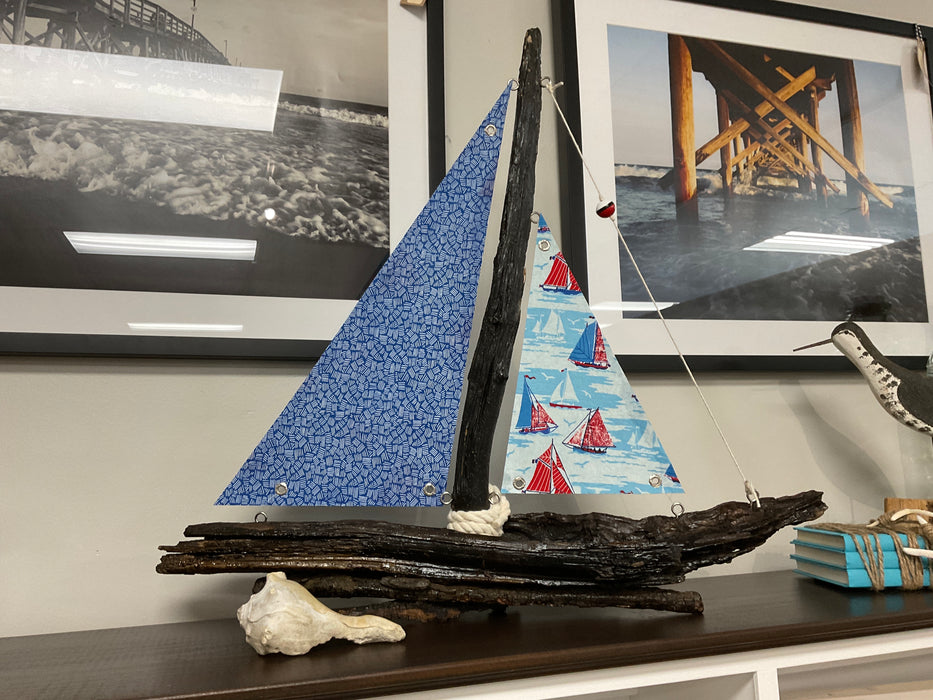 Driftwood sailboat with sails