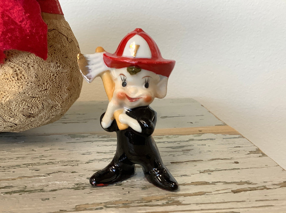 Vintage 1930’s ceramic fireman pixie
