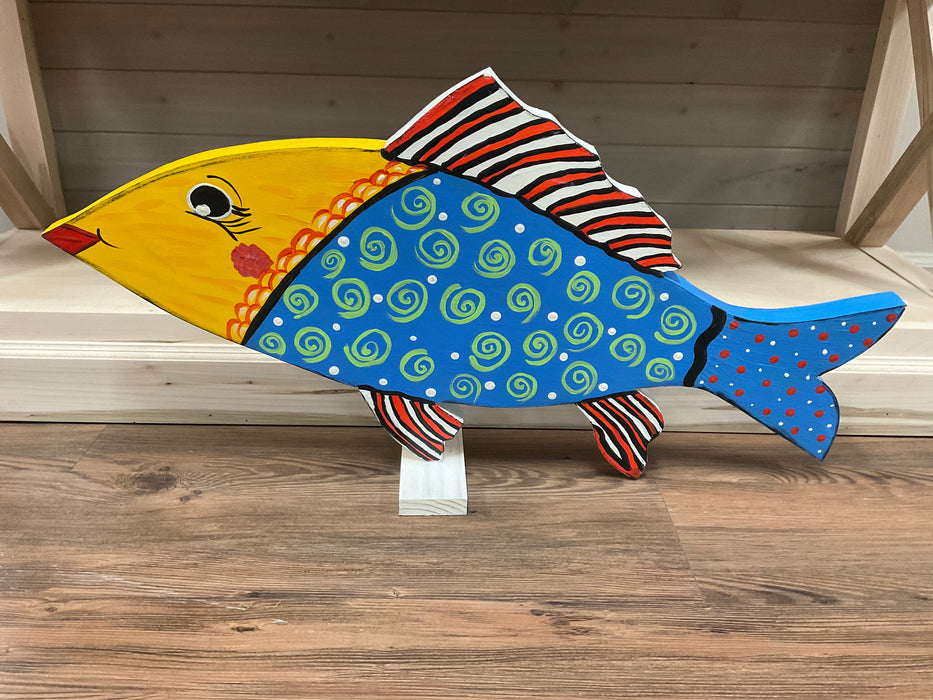 Colorful fish on a stand