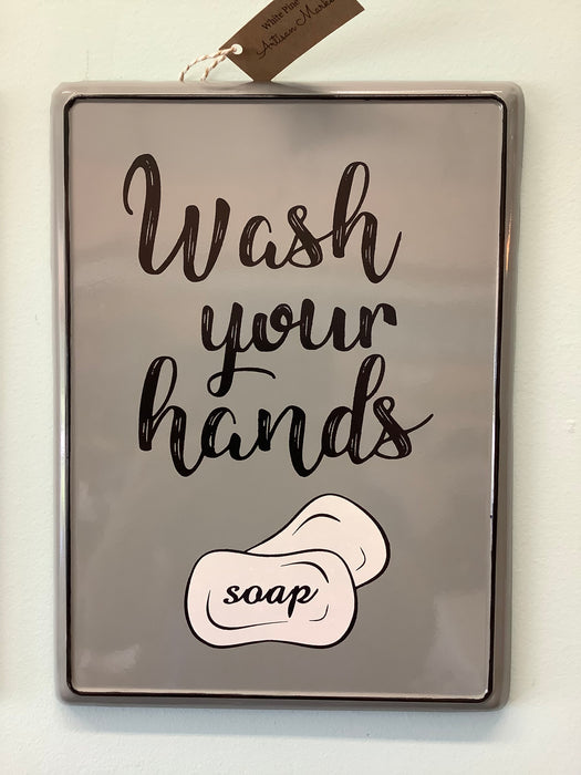 Gray enameled sign