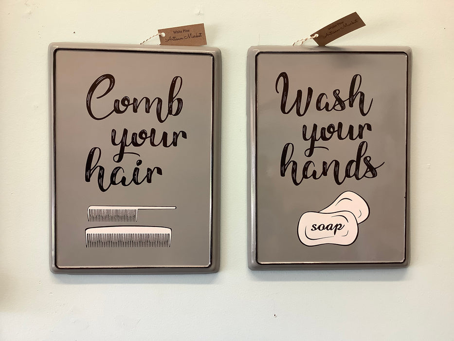 Gray enameled sign