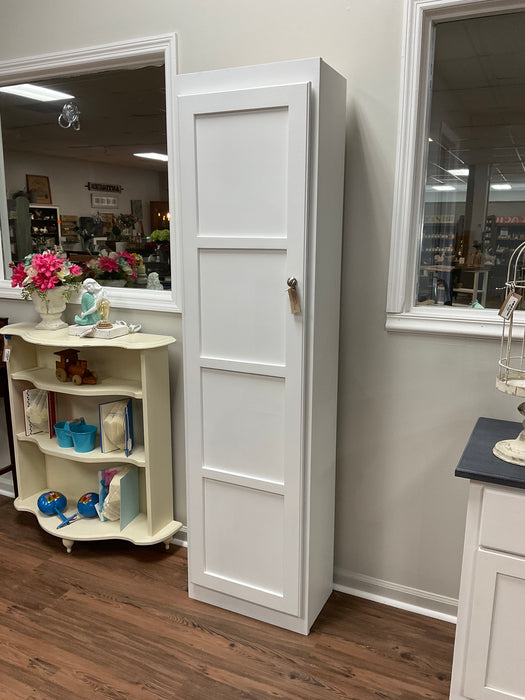 White broom closet