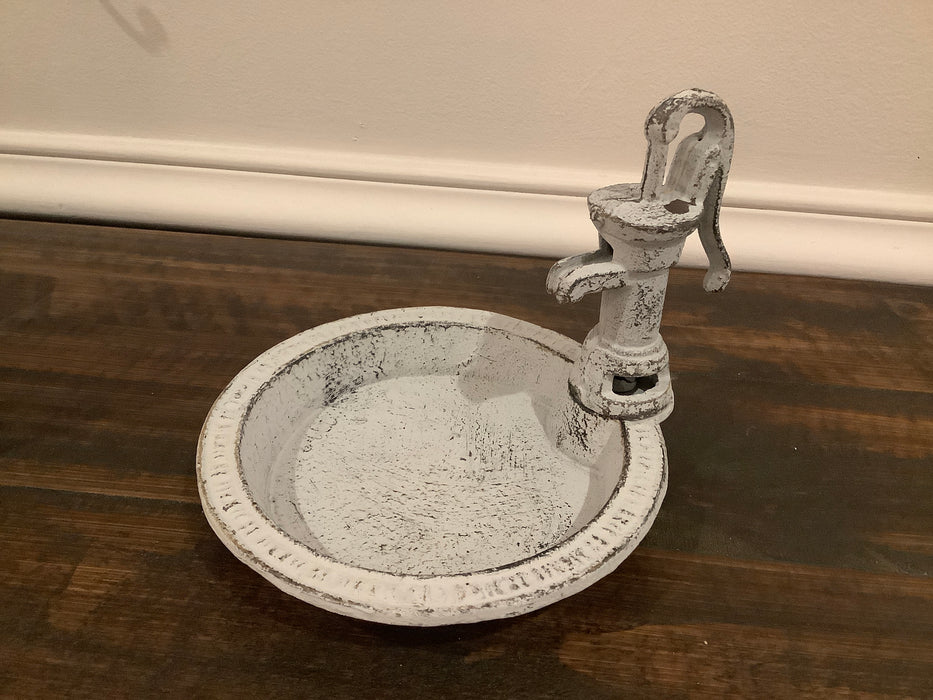 Water pump soap dish