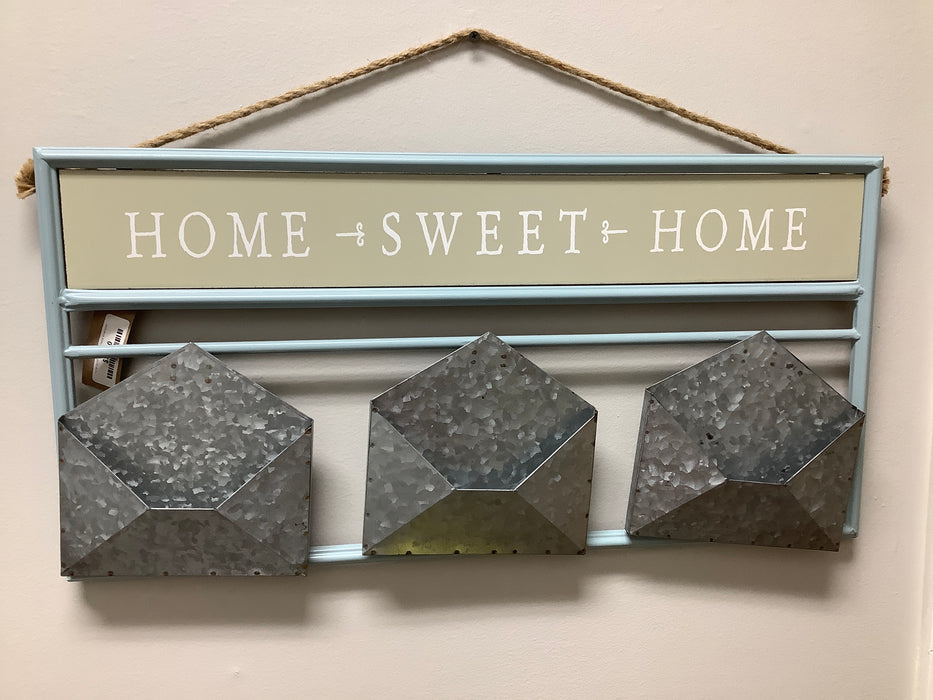 Home sweet home with metal envelopes