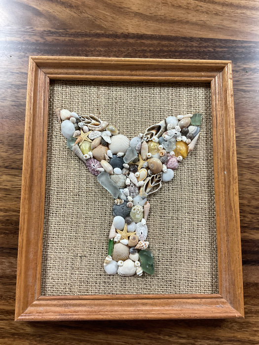 Framed whale tail shell art