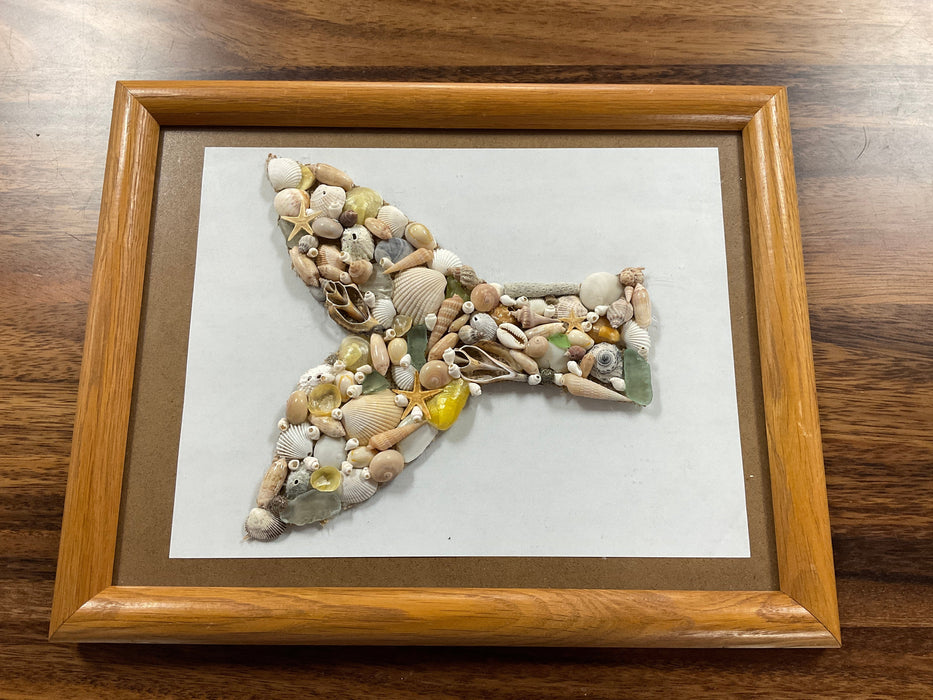 Framed whale tail shell art