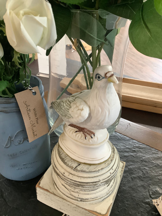 Ceramic pigeon figurine