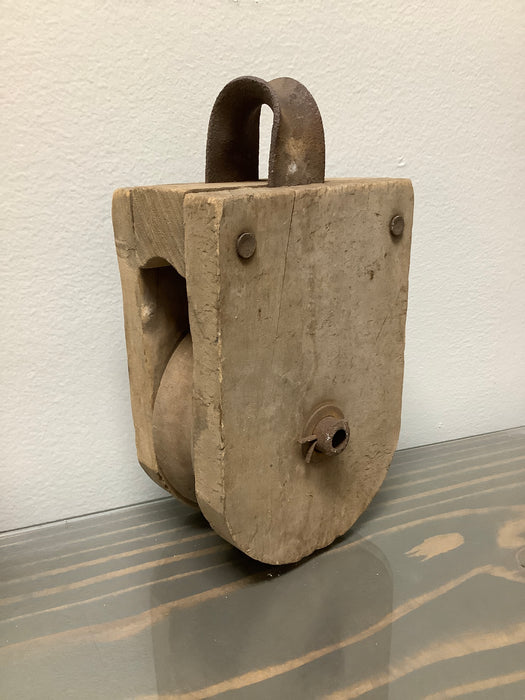 Antique wood and metal pulley