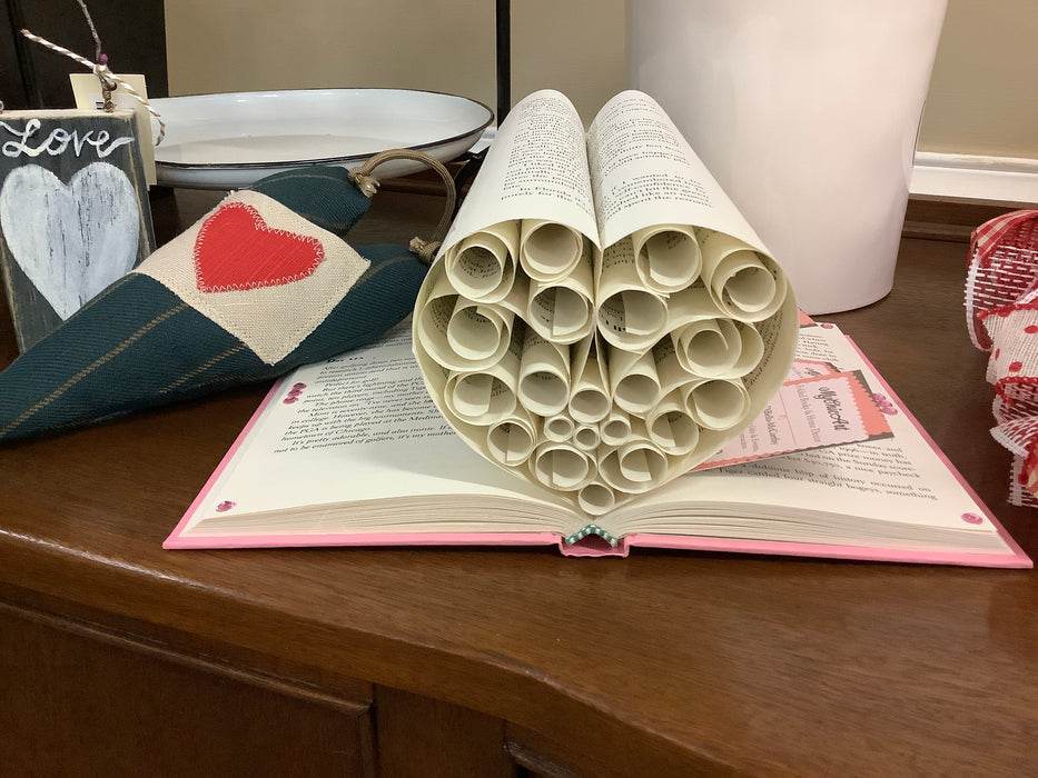 Rolled heart shaped book