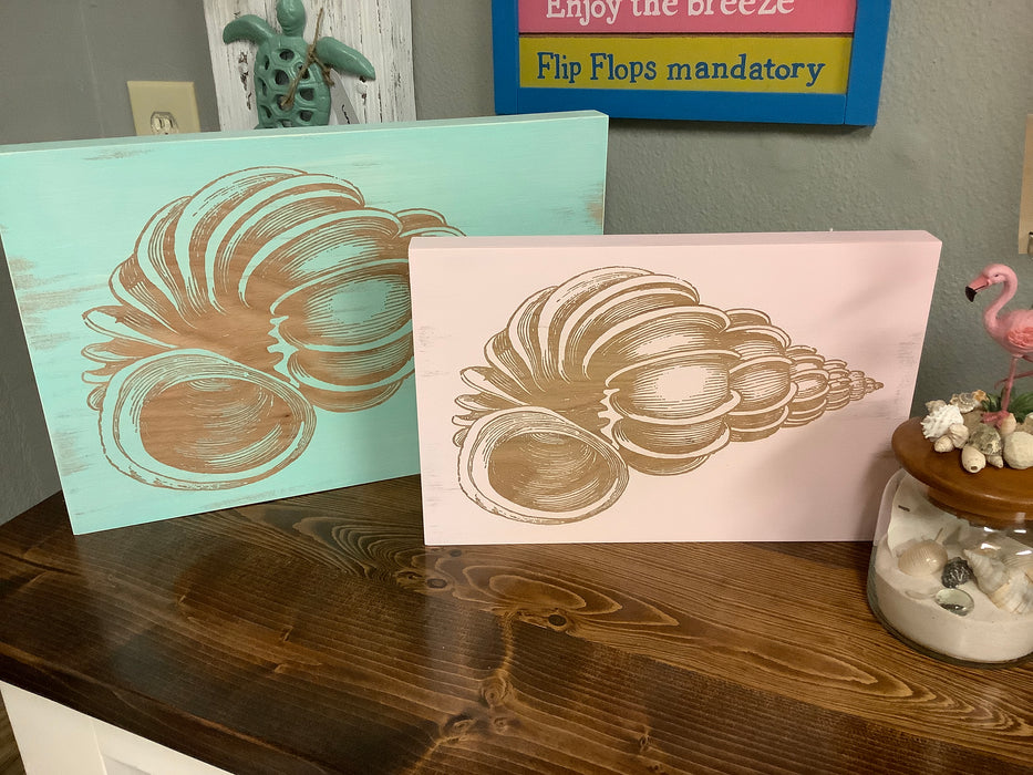 Conch shell engraved picture