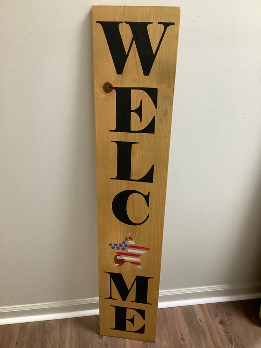 Welcome sign red white blue star