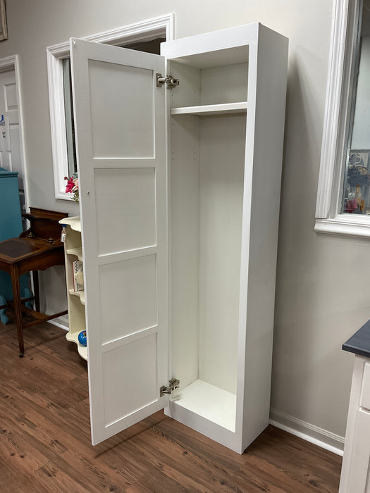 White broom closet