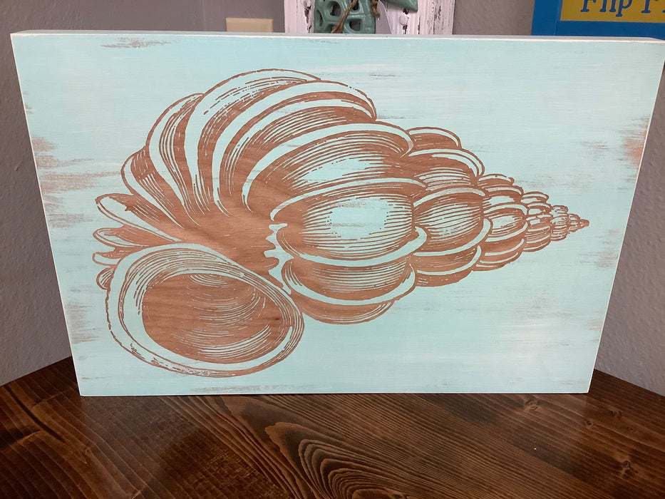 Conch shell engraved picture