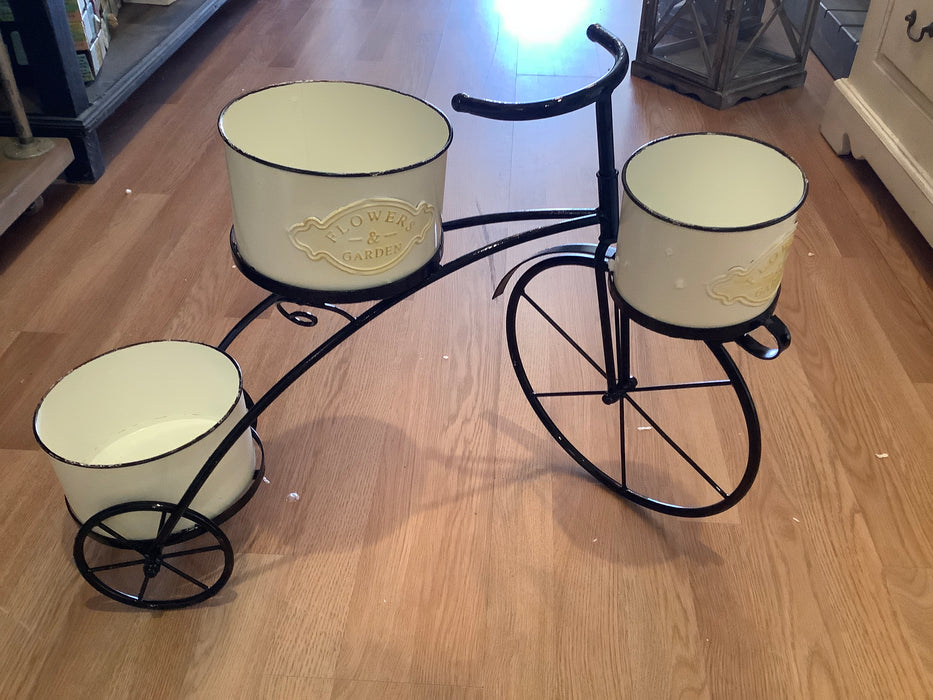 Tricycle planter, flowers and garden