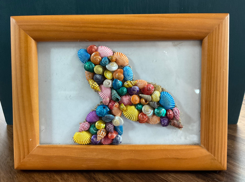 Framed whale tail shell art