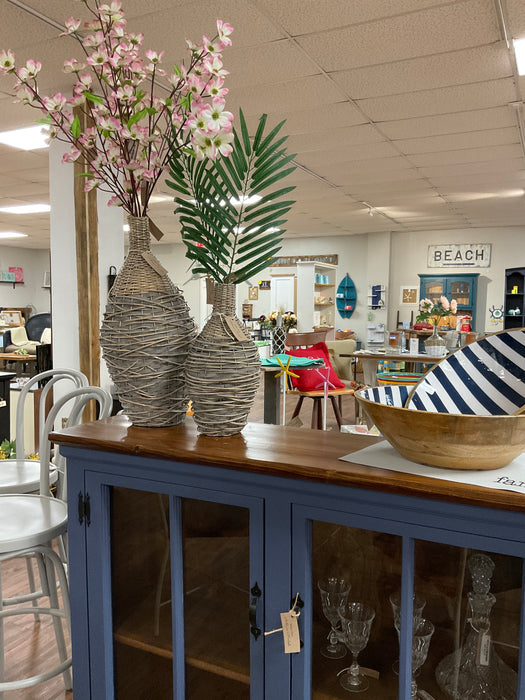 Woven willow and metal vase