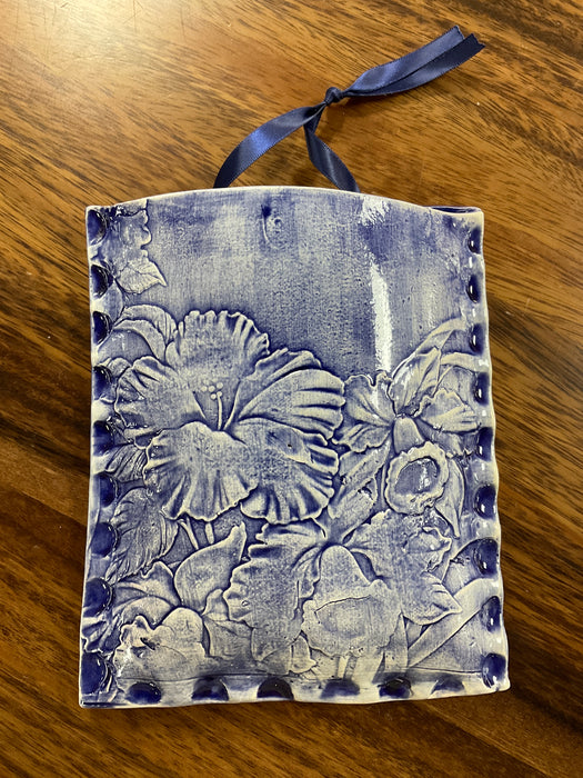 Embossed floral wall pocket