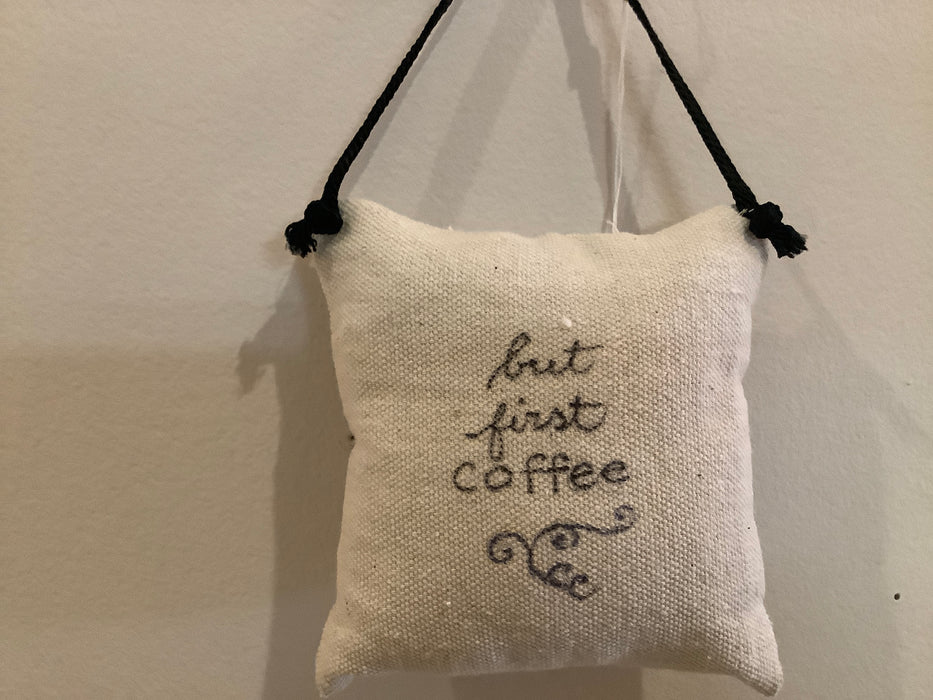 Hanging pillow with written phrase