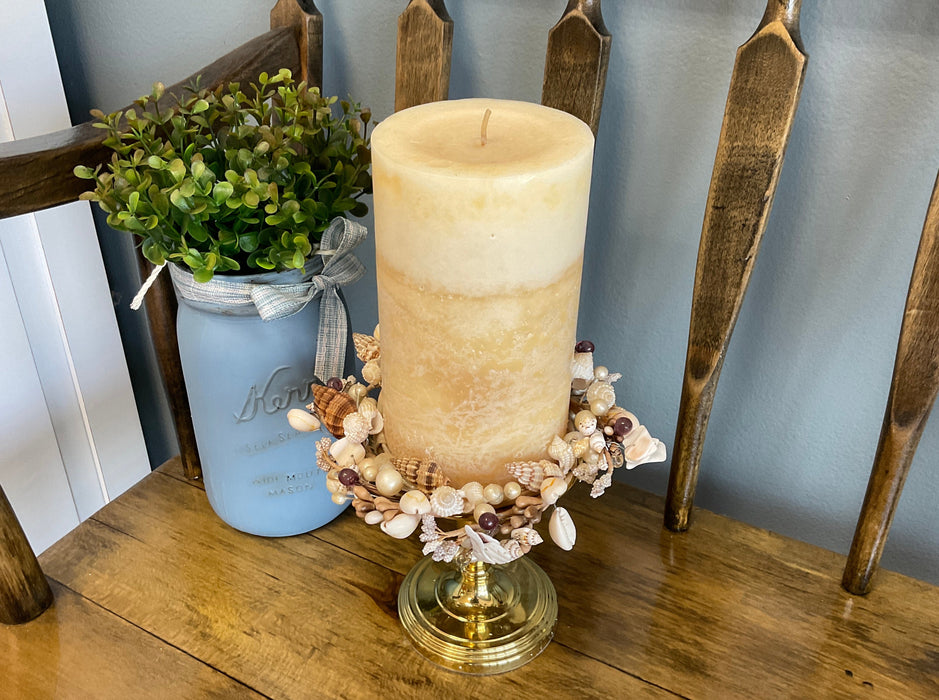 Candle on gold stand