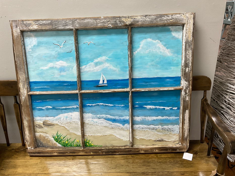 Sail boat beach window scene
