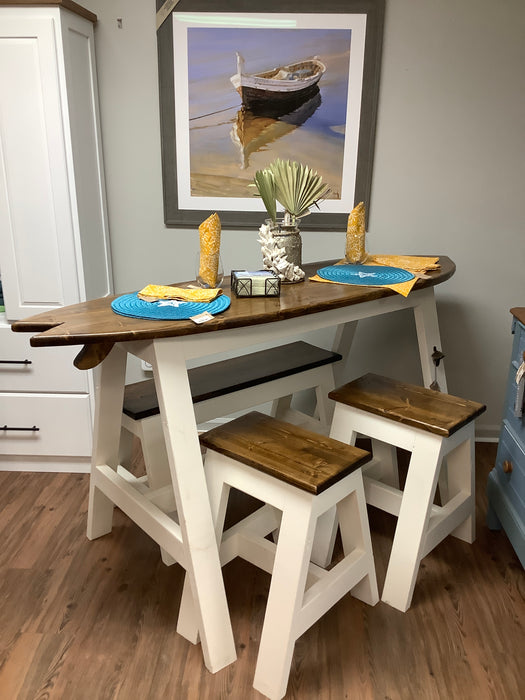 Surfboard table with bar stools