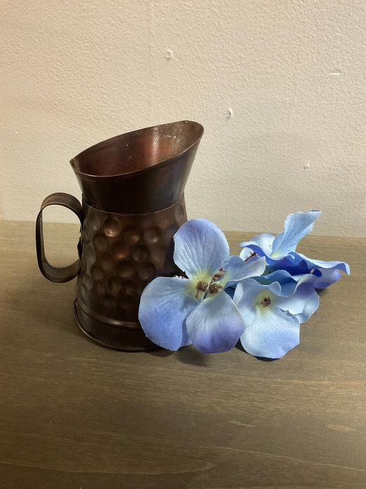 Small metal pitcher