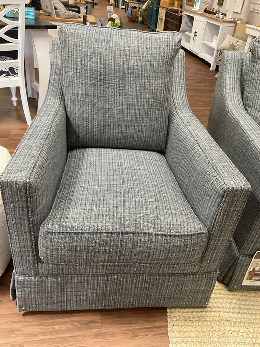 Upholstered swivel chair in denim