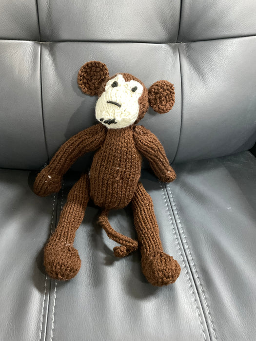 Hand knitted stuffed monkey