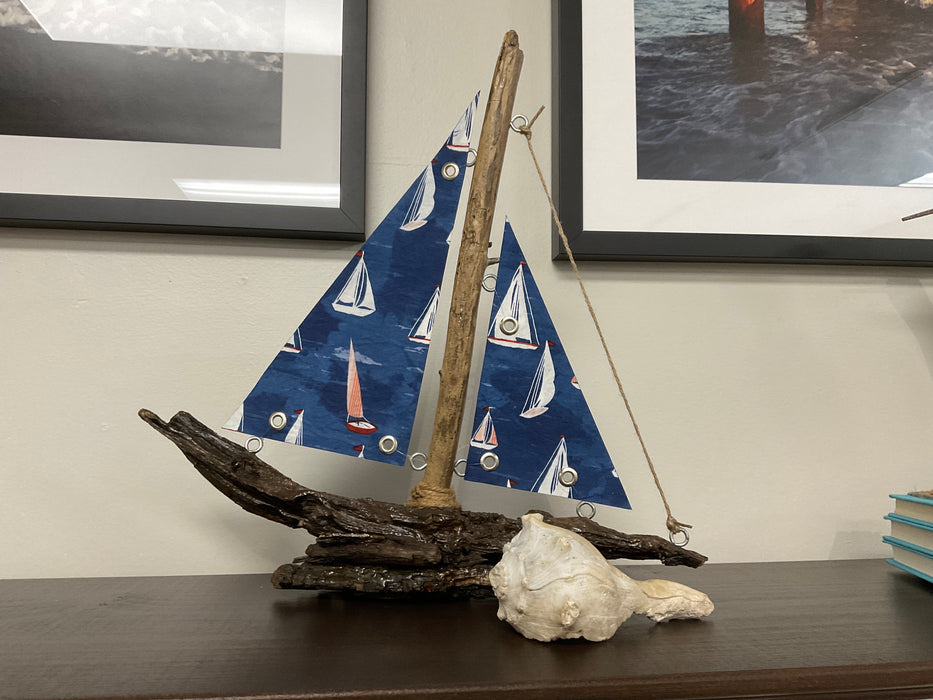 Driftwood sailboat with sails