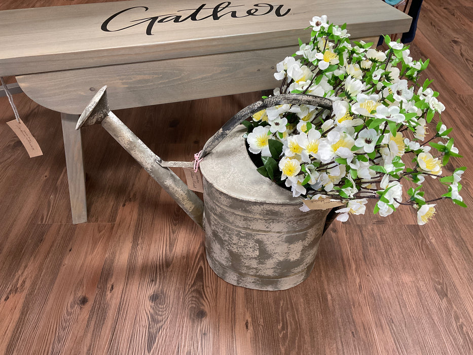 White distressed watering can