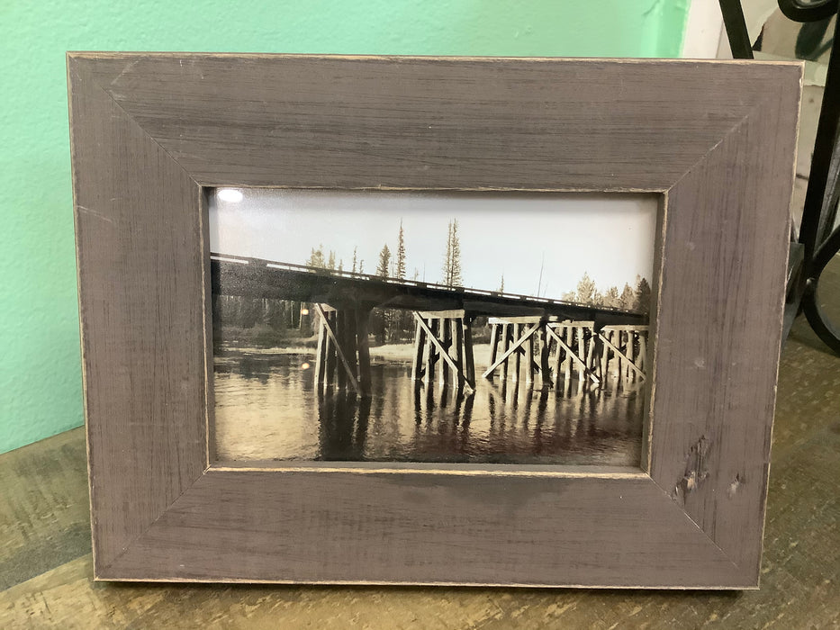 Wood bridge photo in brown frame