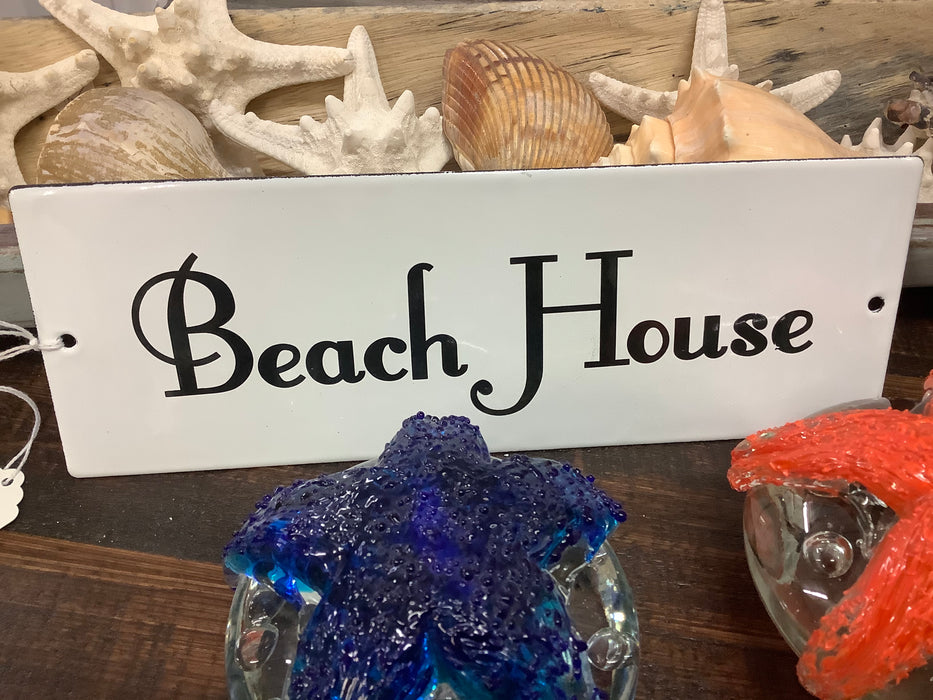 White enamel beach house sign