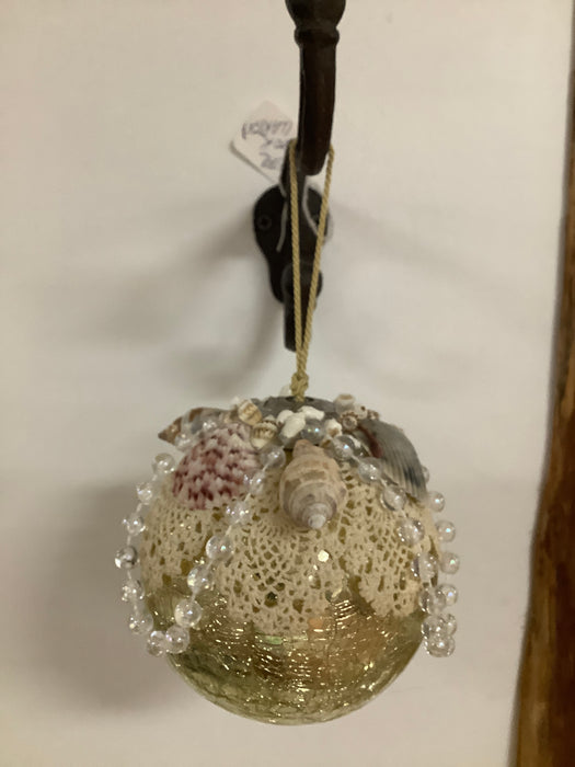 Sea shell decorated Christmas bulb