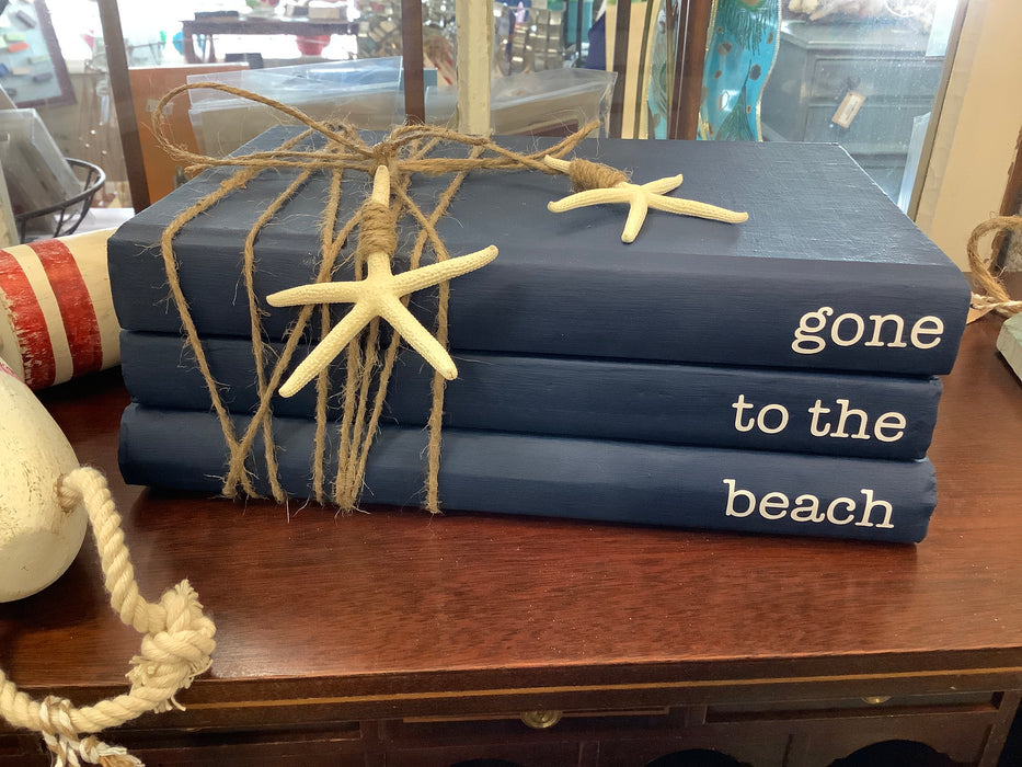 Book stack - gone to the beach