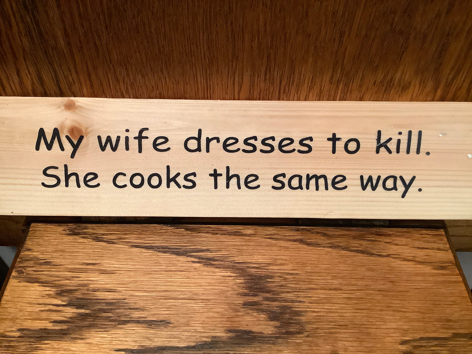 Funny wood sign - My wife dresses