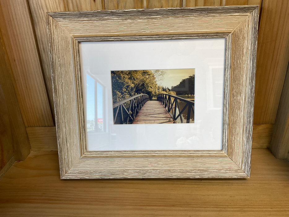 Framed picture of metal bridge