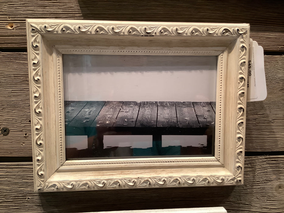 Black and white wood dock photo in frame