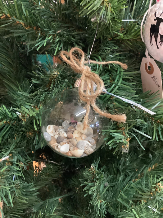 Glass ornament with shells