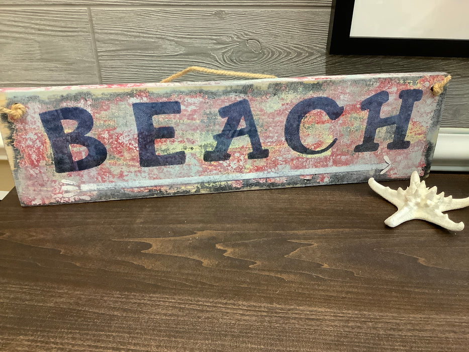 Small rustic beach sign