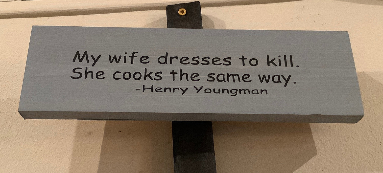 Funny wood sign - My wife dresses