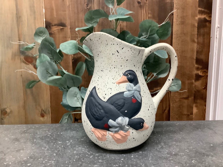 Pottery pitcher with goose