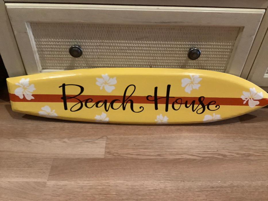 Beach house surfboard